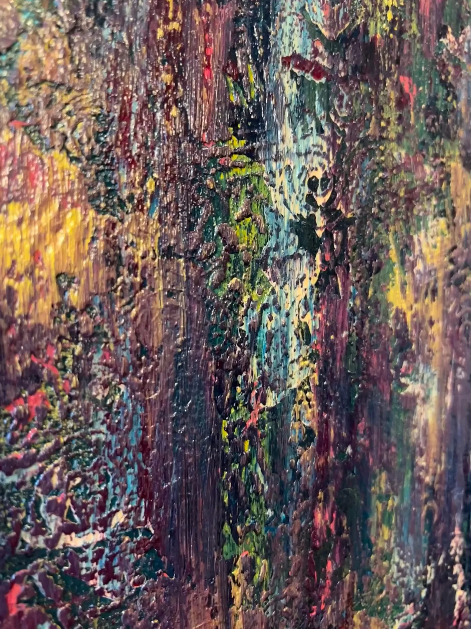 Angled close-up of the layered burgundy, teal, green, gold, and coral textures in Embers Through the Rain.