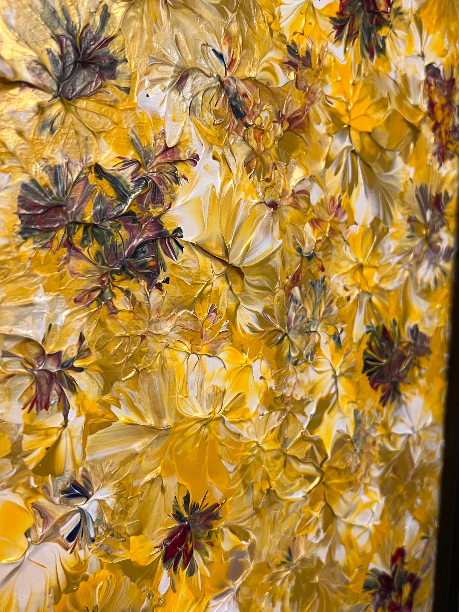 Close-up view of the dimensional yellow, cream, gold, and purple paint textures in Golden Meadows.