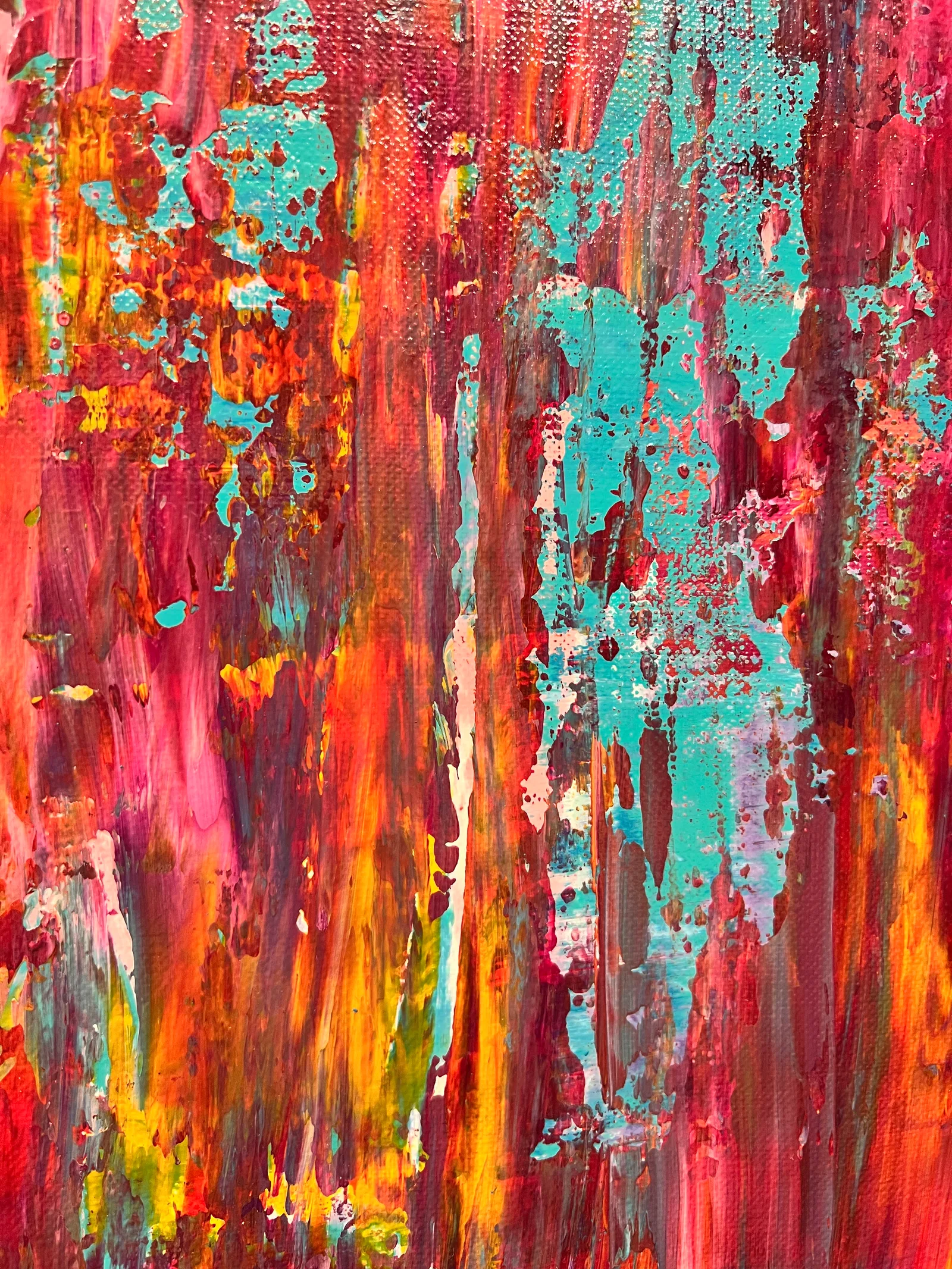 Close-up of the layered pink, red, turquoise and orange paint textures in Malibu.