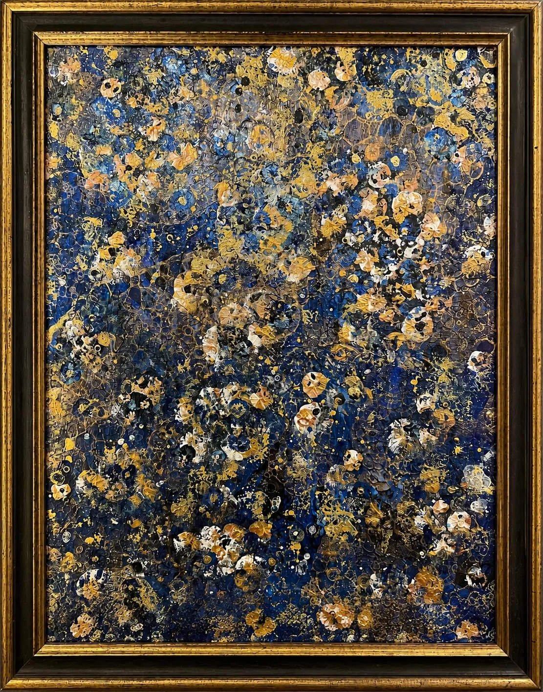Orion’s Garden, a richly textured abstract painting in deep blue, gold, cream, peach, and black in an ornate black-and-gold frame.