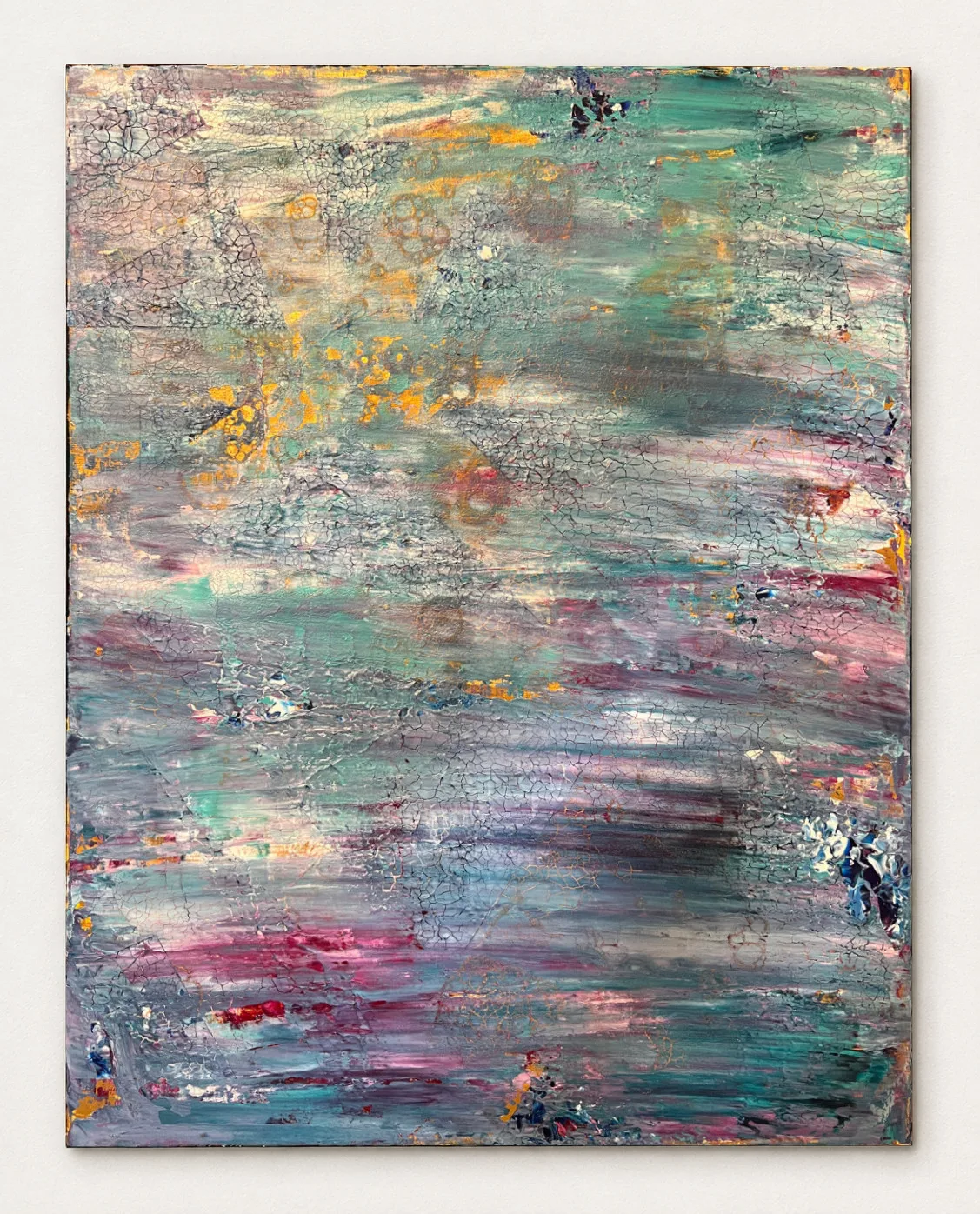 Tidal Reflections, an unframed turquoise, blue-grey, lilac, magenta, white, and gold abstract painting displayed against a white wall.